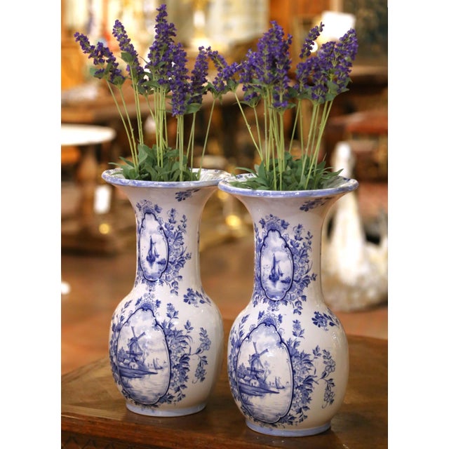 Decorate a console, mantel, or bookshelf with this elegant pair of antique Delft vases. Crafted in Holland circa 1920, the...