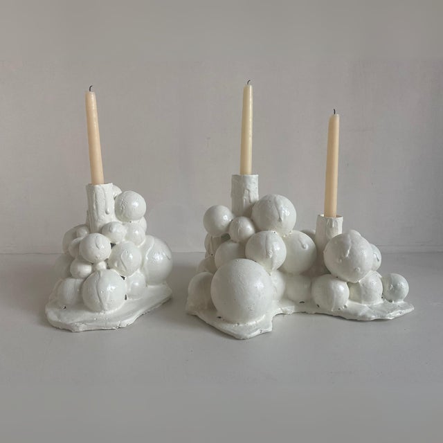 “Bubbles Candelabra 01 White”, a single candle holder candelabra made of bubble shapes with different plastic textures by...