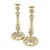 Pair of French Restoration period cast brass candlesticks. The candle shaft is threaded to the domed circular base, and...