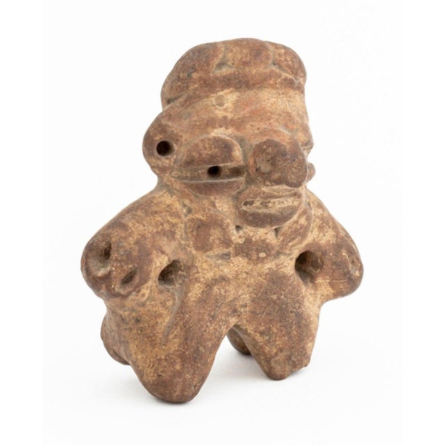 Mayan Pre-Columbian Pottery Figure and Green Stone Head, standing male figure pendant with pierced ears and carved green...