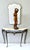 Made in Italy, 1960s. It is made in bronze and features a Portuguese pink marble top. This rare and very elegant console...