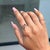 This Toi et Moi open bypass ring showcases 0.8 carats of two vibrant natural sapphires set in 14k white gold. Each...