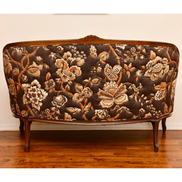 This vintage Louis XV–style carved walnut settee blends the romance of 18th-century French Rococo design with the bold...