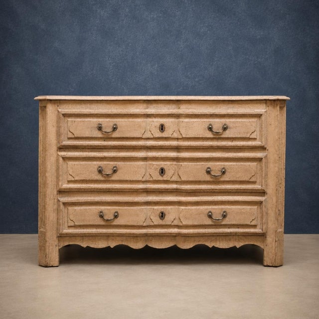 This stunning 19th Century French Oak Bleached Chest of Drawers blends timeless European craftsmanship with a fresh,...