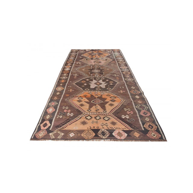 Vintage handwoven decorative kilim rug from Kars region of Turkey. Approximately 50-60 years old. In very good condition.