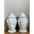 This pair of vintage ceramic lidded urns presents a classic baluster silhouette, with softly shouldered bodies tapering to...
