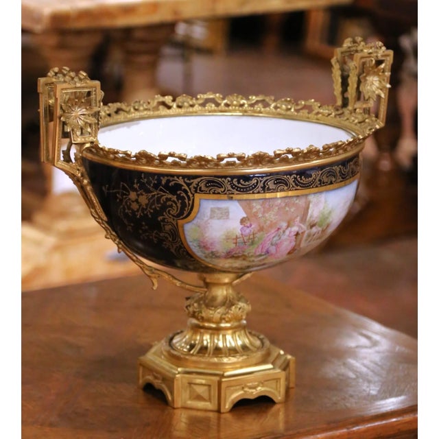 This refined antique French porcelain centerpiece was produced in the Sèvres tradition, circa 1880, and exemplifies the...