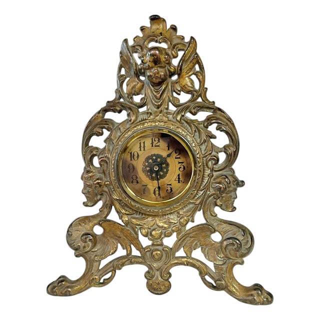 Antique Art Nouveau Cast Iron Clock With Cherubs and Griffins For Sale