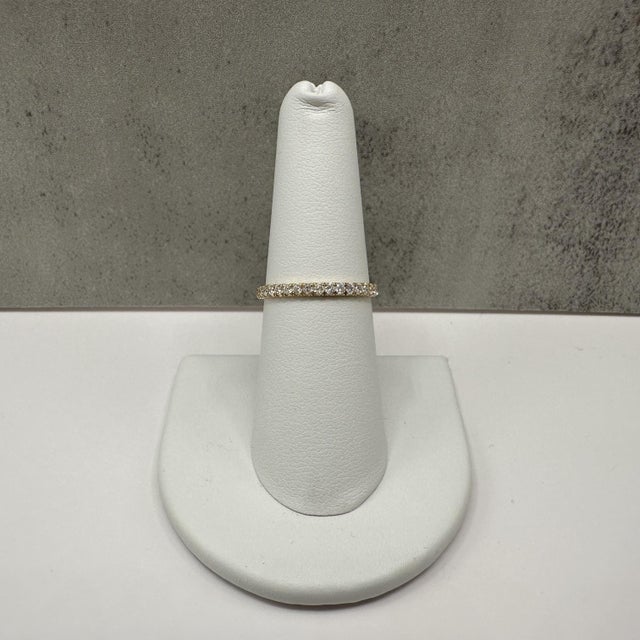 This lab grown diamond band is crafted in 14kt yellow gold and features 0.35 carat total weight of lab grown round...