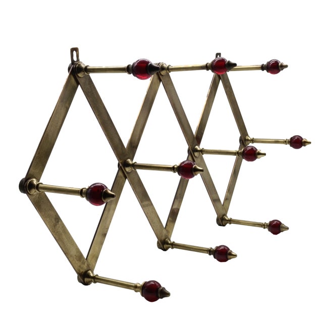 Extremely rare adjustable coat rack, model "AT4," designed by Italian architect Luigi Caccia Dominioni and produced by...