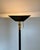 Well-made tall floor lamp in gunmetal and brass, dimmable and adjustable light source. Designed and produced in belgium by...