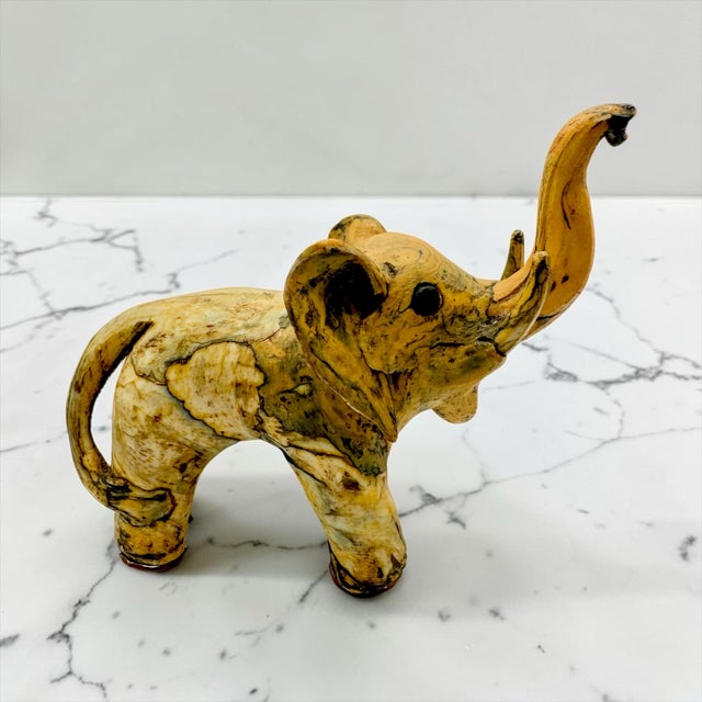 Crafted by skilled artisans in the Philippines during the mid-20th century (circa 1950s–1960s), this captivating sculpture...