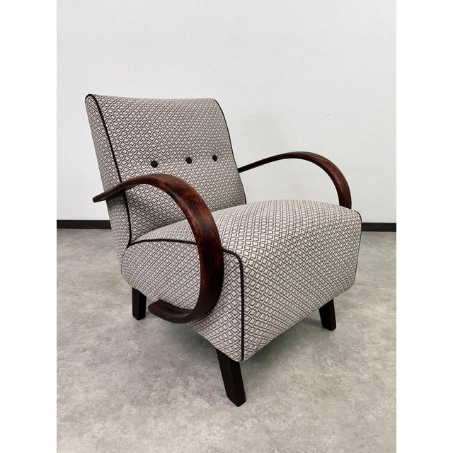 Art deco armchair by Jindřich Halabala for UP Závody. Professionally stained and repolished. This piece is attributed to...