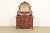 A gorgeous antique Victorian serpentine front vanity dresser with mirror By Widdicomb USA, Circa 1890s Carved mahogany,...