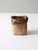 This vintage handmade studio pottery vase features a slab-built construction with a textured, earthy surface. The organic...