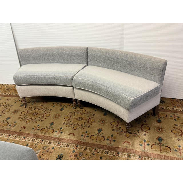 Design Plus Gallery presents a Two Piece Custom Made Curved Sectional. The sectional is of two tones, white with gray,...