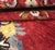 Vintage handwoven wool Turkish Oushak rug featuring a central medallion on a rich red field. Some slight wear on one end....