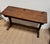 A charming antique French double school desk crafted from solid oak, dating from the early 20th century. This authentic...