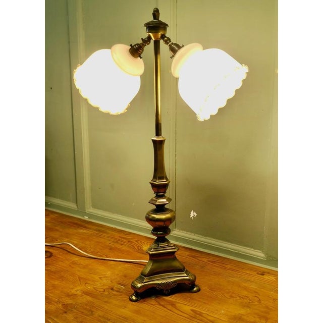 Brass Twin Angled Reading Lamp This is a very attractive piece, the lamp has a central brass column which supports two...