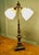 Brass Twin Angled Reading Lamp This is a very attractive piece, the lamp has a central brass column which supports two...