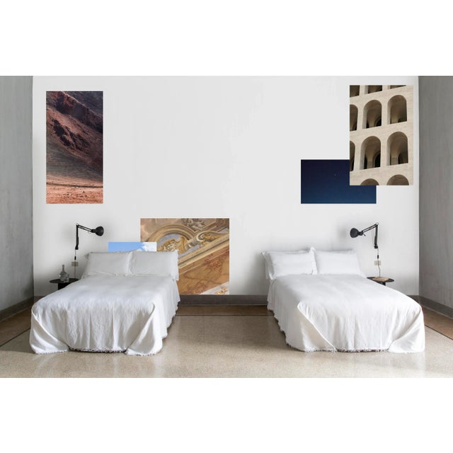 A photographic moodboard spread on the wall, that makes people able to travel through multiple “windows” opened on many...