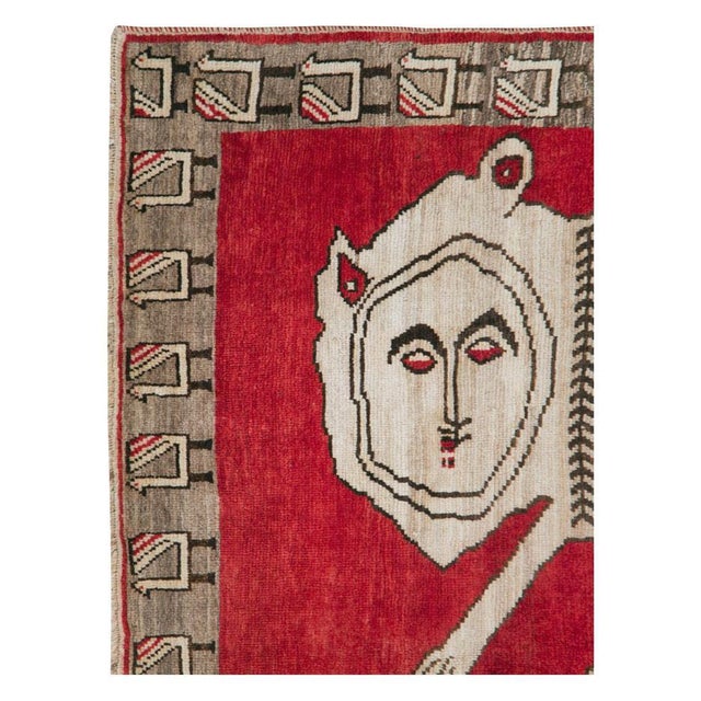 A vintage Persian Gabbeh tribal accent rug handmade during the mid-20th century with a pictorial design of a lion....