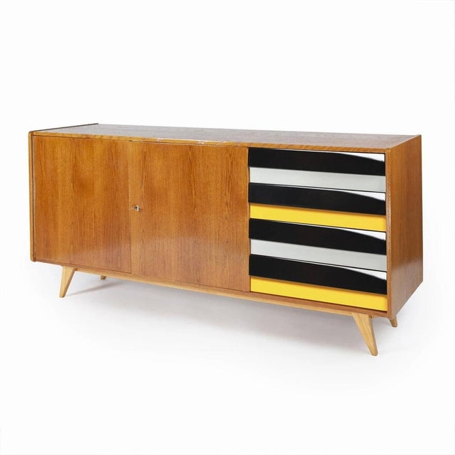 The chest of drawers is part of the famous universal series (u-450) designed in 1958 by jiří jiroutek for the czechoslovak...