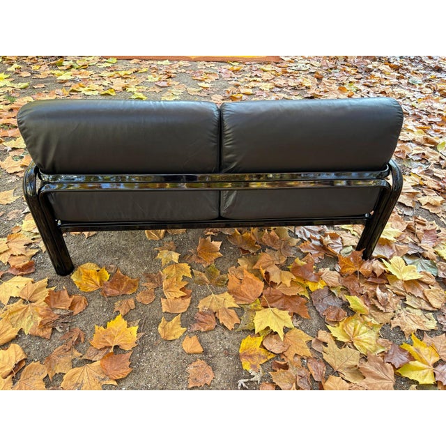 The 'Loveseat' sofa, designed in 1976 by the Italian design icon Gae Aulenti, is now an absolute cult design piece and...