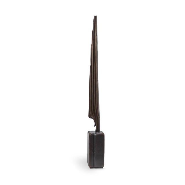Stele II resembles a fragment of solidified earth – a narrow, upright body that seems to have pushed its way to the...