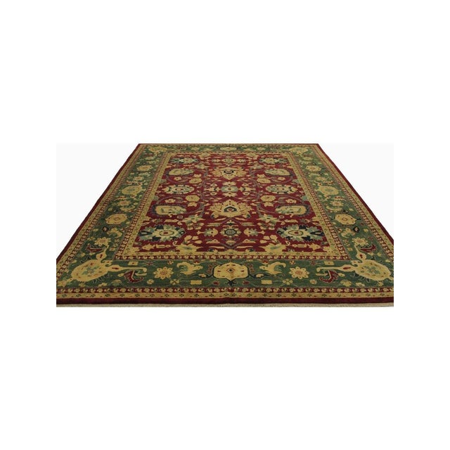 Bring elegance to your home with this one-of-a-kind 12x16 Handwoven Indian Agra Area Rug, showcasing a captivating floral...