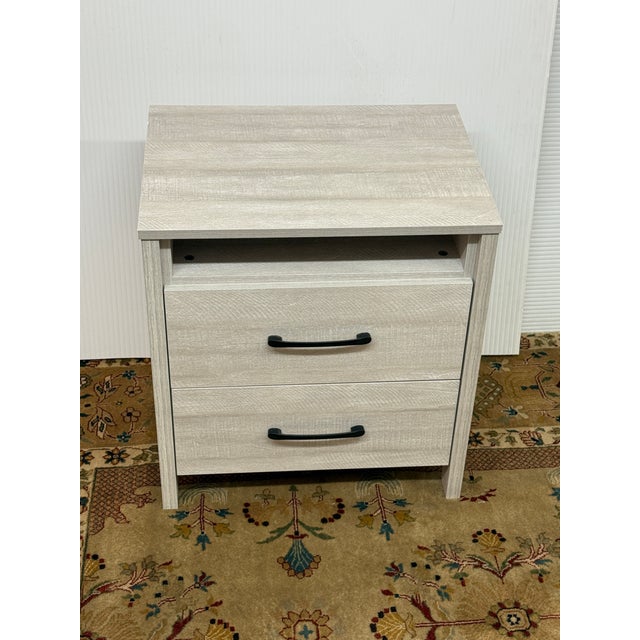 Design Plus Gallery presents the Modern Nightstand in Dusty Gray Oak from Galano. The cabinet has two smooth glide drawers...