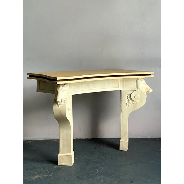 Presenting a truly exceptional pair of vintage console tables, each a remarkable example of Hollywood Regency grandeur and...