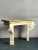 Presenting a truly exceptional pair of vintage console tables, each a remarkable example of Hollywood Regency grandeur and...