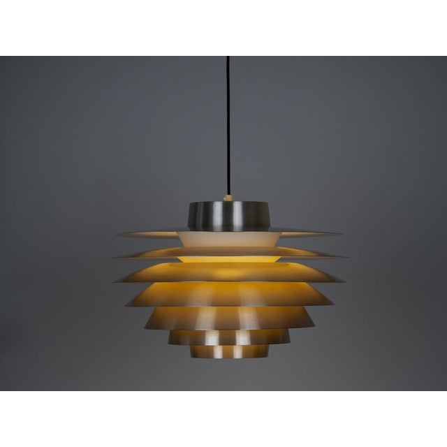 Designed by Svend Middelboe in 1962 and manufactured by Nordisk Solar, this lamp is a jewel of not only Danish but also...