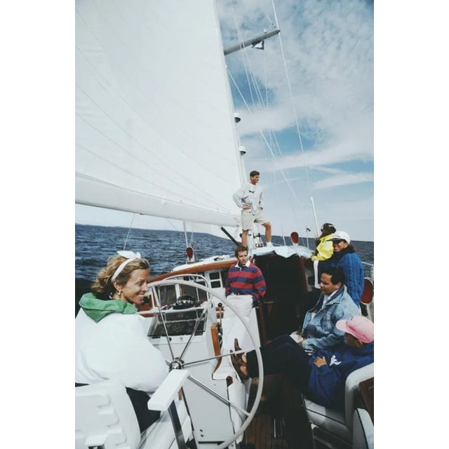 On Board The Palawan 1992 by Slim Aarons Slim Aarons Limited Estate Edition Olive Watson (left) takes her friends out...