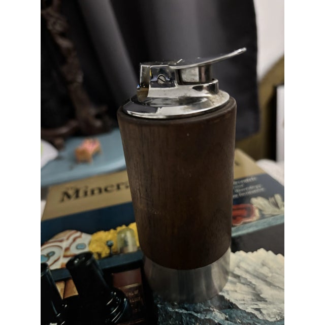 Vintage MCM Ronson Norseman Table Lighter. Materials: Walnut & Chrome. Selling in as is, Preowned condition. Cabinet home...
