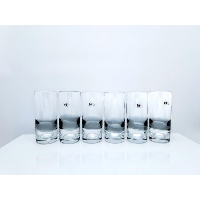 A set of six highball glasses, a testament to the excellence and tradition of the renowned NasonMoretti glassworks in...