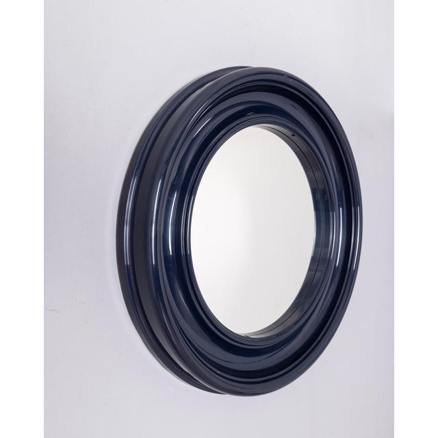 Round wall mirror with blue plastic frame, Italian design, 1970s.