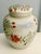Charming mid‑century Chinese export hand‑painted lidded jar featuring soft pink, red, and green florals with delicate,...