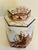 Vintage porcelain tea caddy featuring an elegant square form with a fitted lid, beautifully decorated in rich sepia...