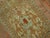An early 20th century antique Persian Senneh Mat featuring a small hand inside a blue green medallion. Accents in blue,...