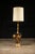 Ornate 1950s gilded lotus flower floor lamp stand with attached tempered glass table.