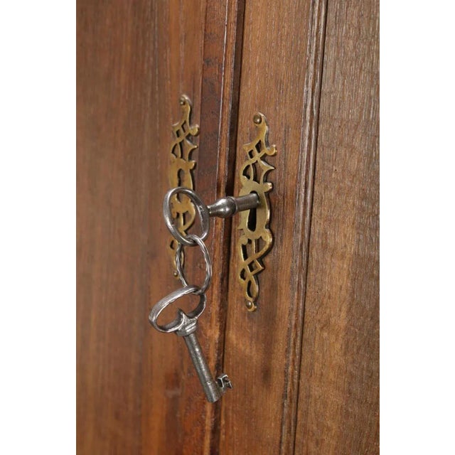 - Swedish cupboard from around 1700 - The oak cabinet features drawers with their original locks and fittings - The key is...