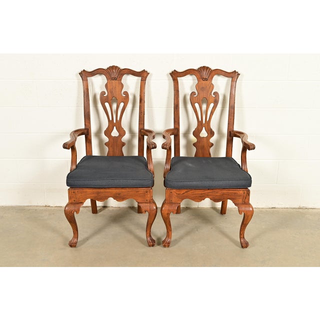 An outstanding pair of Chippendale or Georgian style armchairs or dining captain chairs By Henredon USA, Circa 1980s...