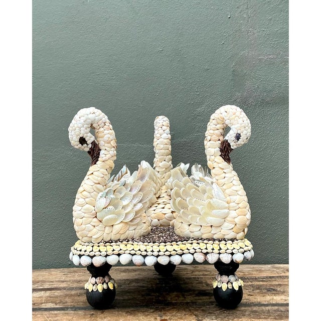 This captivating vintage shell-encrusted swan table showcases an intricate, highly detailed design featuring intricately...