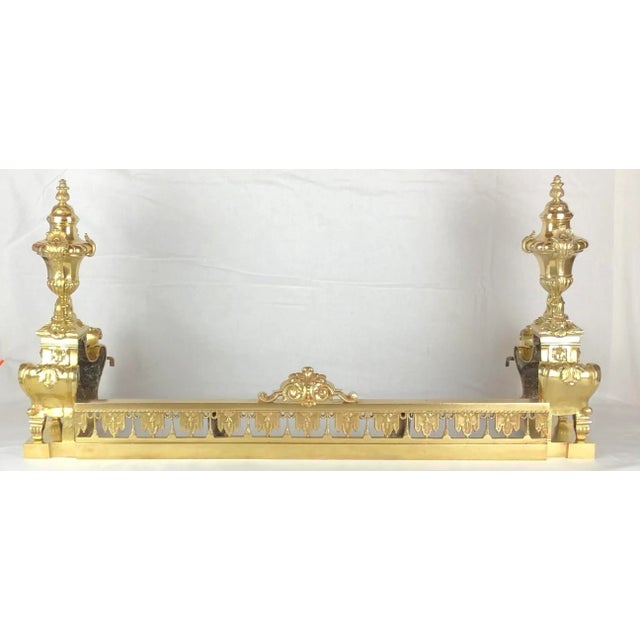 Exquisite French Louis XVI gilded bronze andirons or chenets with centered urn having festoons (flowers, foliage and...