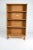 A substantial and architecturally grounded storage piece. Danish oak bookcase in the style of Henning Kjærnulf, dating to...