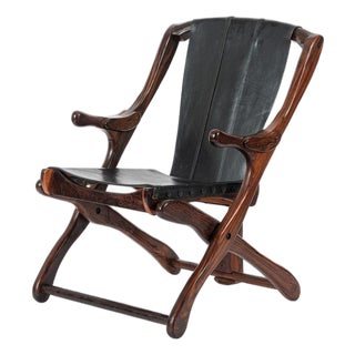 Mid Century Rosewood & Black Leather Folding Lounge Chair by Don Shoemaker For Sale