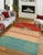This stunning hand-knotted Afghan Balouchi rug is a captivating addition to any decor. Crafted by skilled artisans, it...
