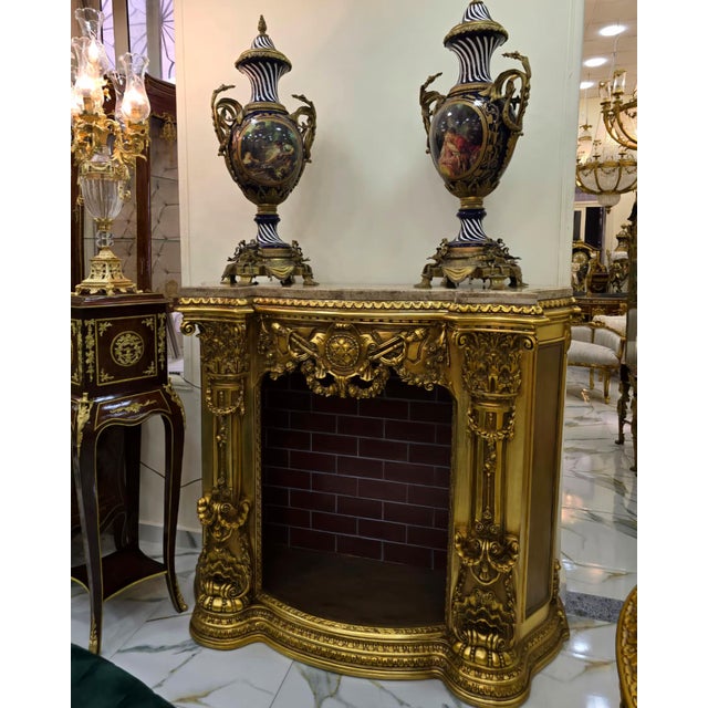 A beautiful fireplace that will impress your guests. With a French style, this piece shows a high level of craftsmanship....
